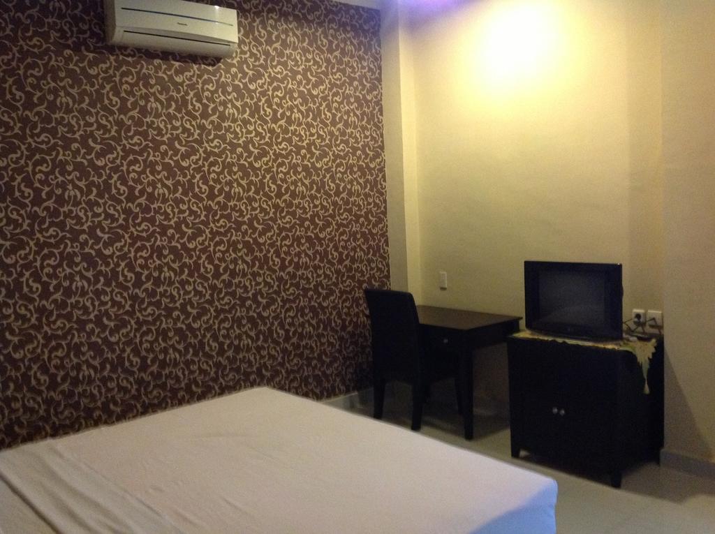 Hotel Carolina Transit Medan Zimmer foto